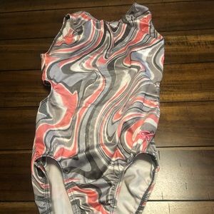 pink and gray GK gymnastics Leo.